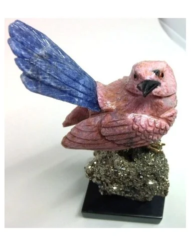 Oiseau opale rose sur pyrite