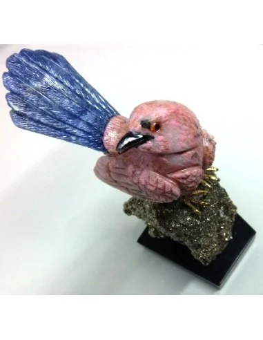 Oiseau opale rose sur pyrite