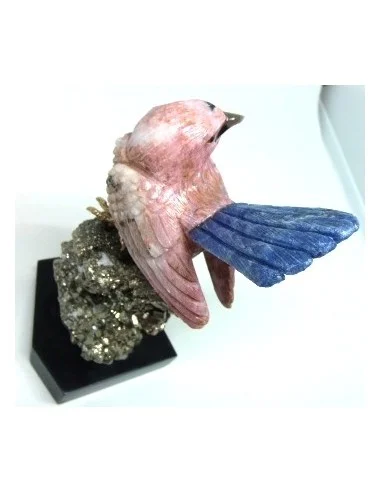 Oiseau opale rose sur pyrite
