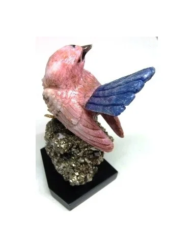 Oiseau opale rose sur pyrite