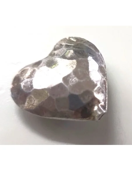 Coeur en argent percée.