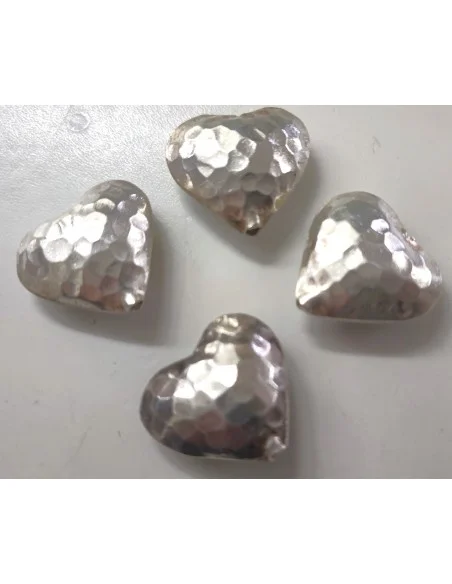 Coeur en argent percée.